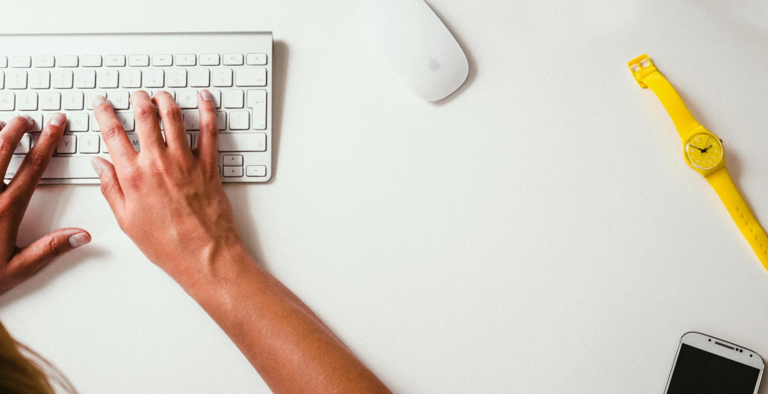 hands on a computer keyboard