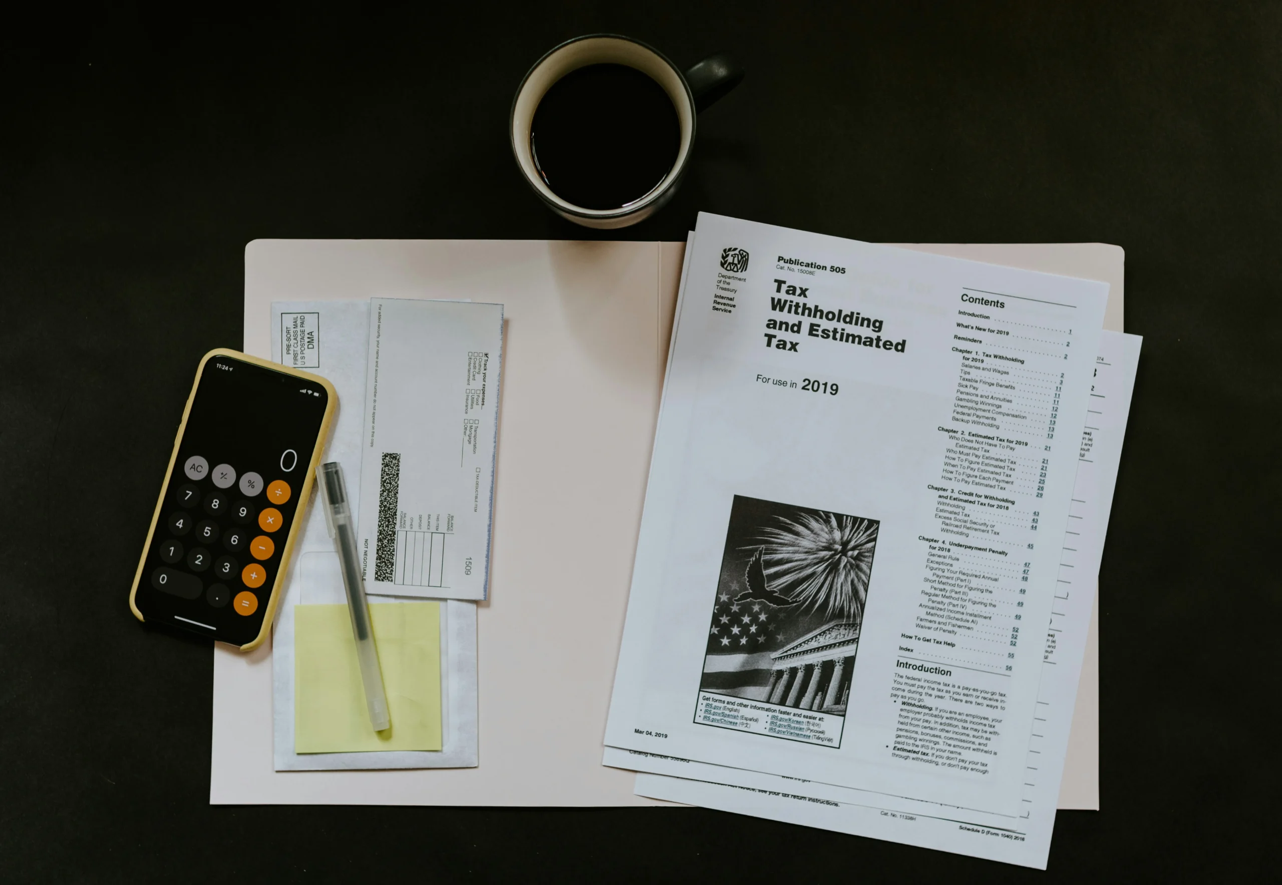 tax documents laid out across a desk